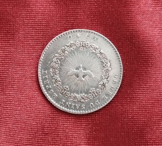 Francouzská stříbrná mince z r. 1740